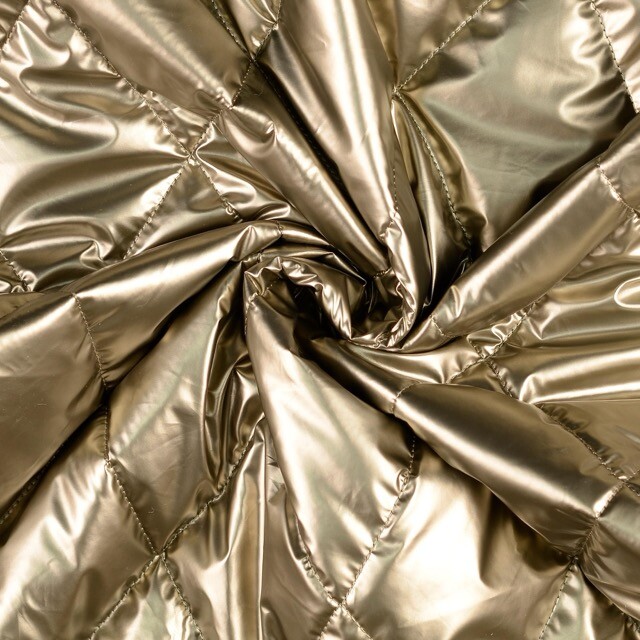 Stepp stof gewatteerd metallic goud