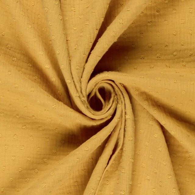 Katoenen mousseline dobby stippen oker