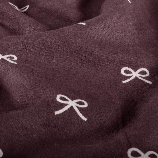 Flanel bedrukt strikjes mauve