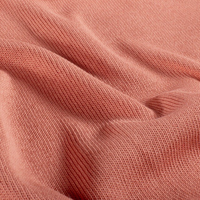 Gebreide stof uni koraal