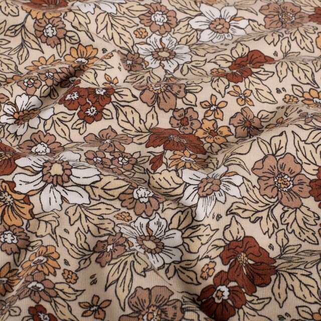 Katoen tricot bloemen beige