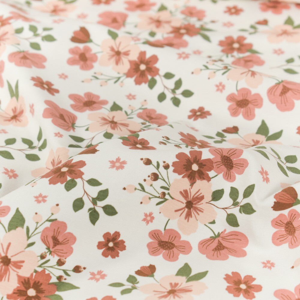 Katoen tricot bloemen offwhite