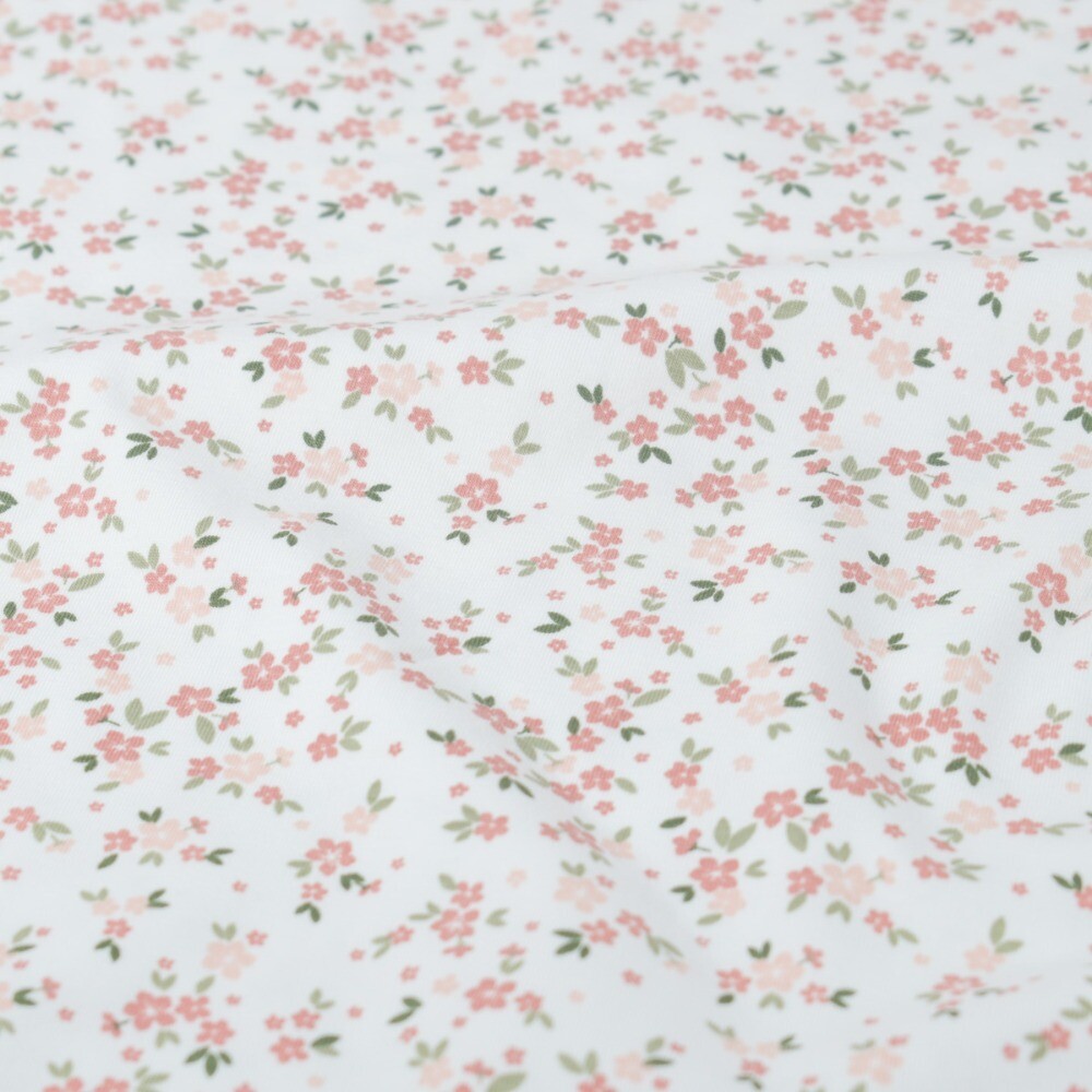 Katoen tricot bloemen offwhite