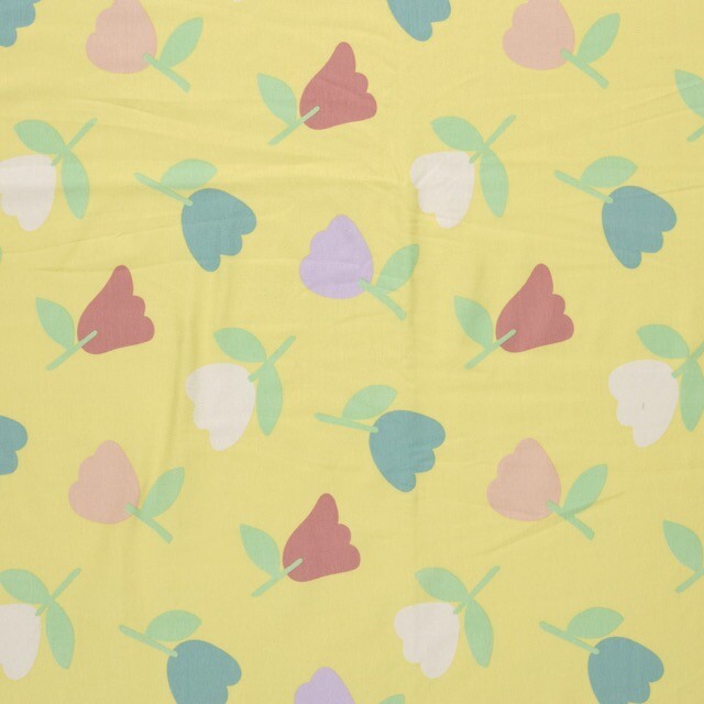 Katoen tricot bloemen geel