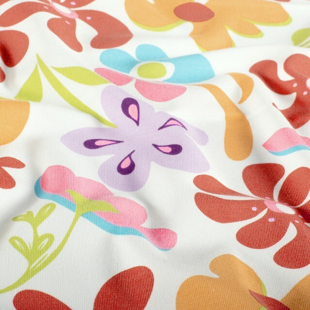 Katoen tricot bloemen offwhite