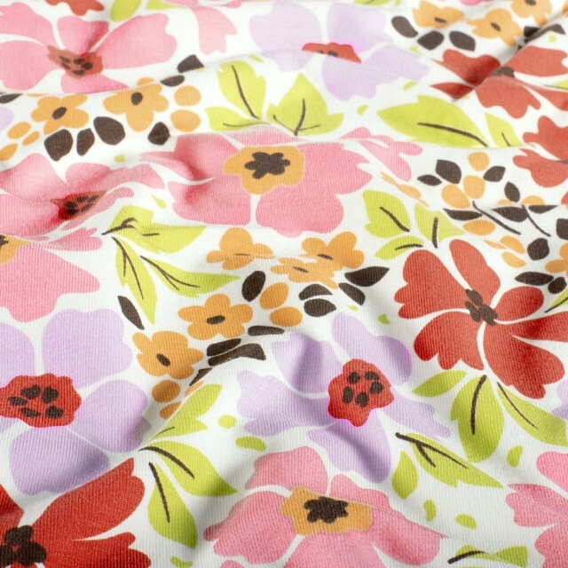 Katoen tricot bloemen offwhite