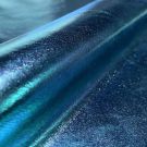 Lamé strech foliedruk uni turquoise