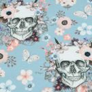 Katoen tricot digitaaldruk doodskoppen met bloemen pastelblauw