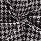 Poly viscose jersey stof discharge bedrukt pied de poule zwart