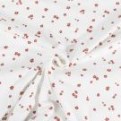 Katoen tricot bloemen offwhite