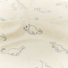Stretch badstof bedrukt dino's beige