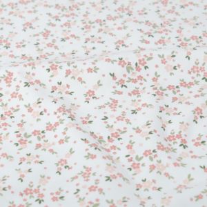 Katoen tricot bloemen offwhite